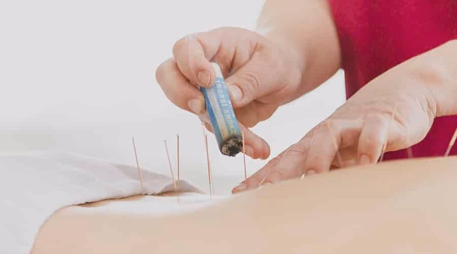 What are the benefits of moxa burning?