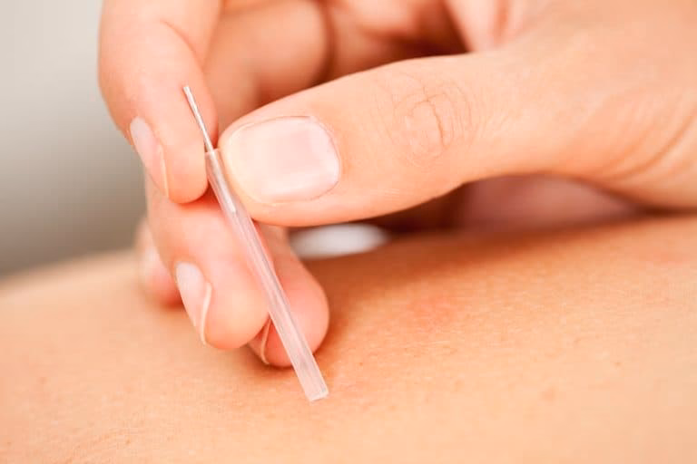 What neutralizes lactic acid in the body?